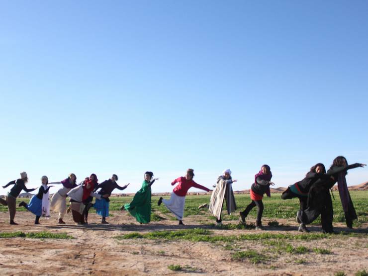 Dancing in the desert, Erg Chegaga, Morocco.
